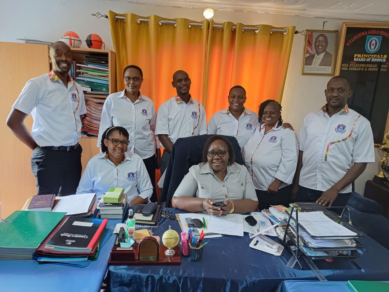 Teachers with students